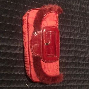 Bebe fabric and rabbit fur clutch